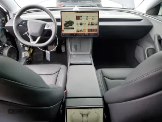 2025 Tesla Model 3 Long Range with VIN 5YJ3E1EA5SF889727, listed as a Copart auction lot 49207545 with 6,980 mi miles and Salvage Title. Bid and sale history available at carsss.com. Image 8.