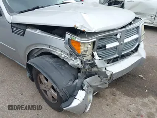 2008 Dodge Nitro SXT z VIN 1D8GT28K38W124264, wystawiony jako IAAI lot #41933674 z przebiegiem 292 756 mil mil oraz . Historia ofert i sprzedaży dostępna na DreamBid. Obrazek 6.