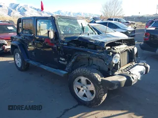 2008 Jeep Wrangler Unlimited Sahara with VIN 1J8GA59188L542812, listed as a IAAI auction lot 41229952 with 127,889 mi miles and . Bid and sale history available at carsss.com. Image 1.