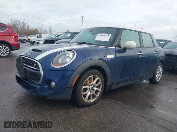 2015 MINI Hardtop 4 Door S with VIN WMWXU3C58FT892238, listed as a IAAI auction lot 41104432 with 156,722 mi miles and . Bid and sale history available at DreamBid. Image 2.