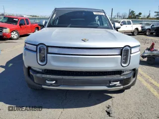 2024 Rivian R1S Adventure with VIN 7PDSGBBA4RN036045, listed as a Copart auction lot 74982414 with 9,256 mi miles and Salvage Title. Bid and sale history available at carsss.com. Image 5.