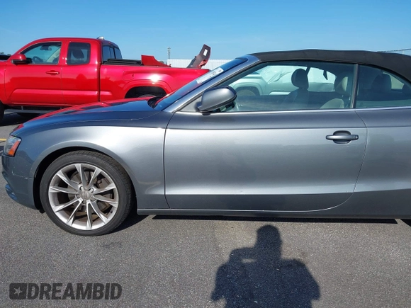 2013 Audi A5 Premium Plus z VIN WAULFAFH5DN009944, wystawiony jako IAAI lot #42508314 z przebiegiem 233 593 mil mil oraz . Historia ofert i sprzedaży dostępna na DreamBid. Obrazek 21.