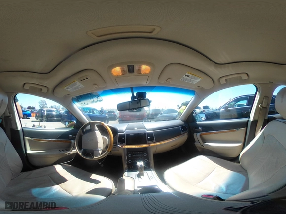 2011 Lincoln MKZ with VIN 3LNHL2GC2BR769295, listed as a IAAI auction lot 41977083 with 103,037 mi miles. Bid and sale history available at carsss.com. Image 19.