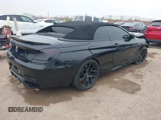 2014 BMW M6 z VIN WBSLZ9C58ED651156, wystawiony jako IAAI lot #41526192 z przebiegiem 90 642 mil mil oraz . Historia ofert i sprzedaży dostępna na DreamBid. Obrazek 4.
