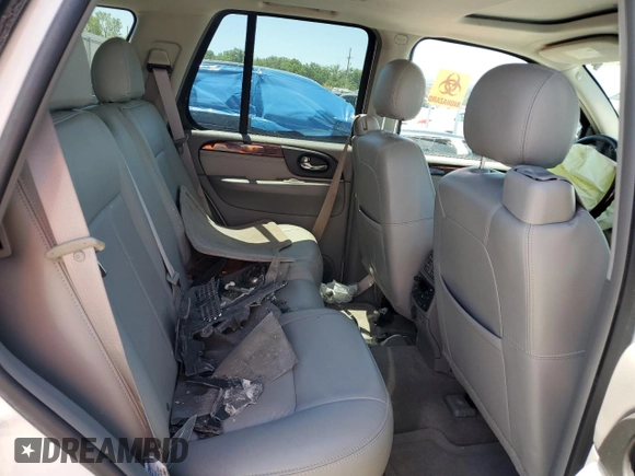 2007 GMC Envoy Denali z VIN 1GKET63M072101556, wystawiony jako Copart lot #57820235 z przebiegiem Nie podano mil oraz Szkoda całkowita • Salvage title. Historia ofert i sprzedaży dostępna na DreamBid. Obrazek 11.
