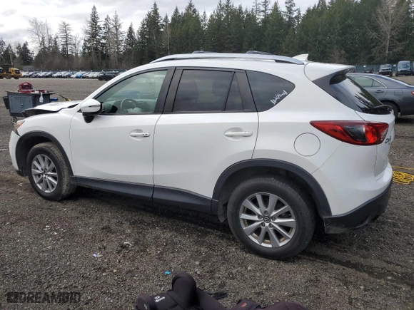 2016 Mazda CX-5 Touring with VIN JM3KE4CY5G0908092, listed as a Copart auction lot 49504015 with 126,825 mi miles and Salvage Title. Bid and sale history available at carsss.com. Image 2.