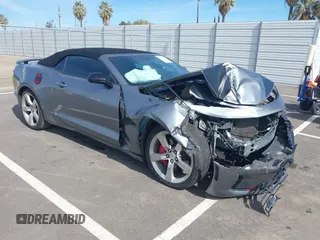 2021 Chevrolet Camaro 2LT z VIN 1G1FD3DS5M0142399, wystawiony jako IAAI lot #41610261 z przebiegiem 72 788 mil mil oraz . Historia ofert i sprzedaży dostępna na DreamBid. Obrazek 1.