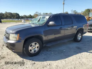 2011 Chevrolet Suburban LS with VIN 1GNSCHE0XBR294973, listed as a Copart auction lot 77258024 with 193,139 mi miles and Salvage Title. Bid and sale history available at carsss.com. Image 1.