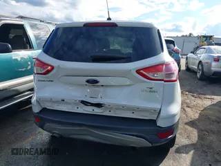 2014 Ford Escape SE with VIN 1FMCU0GX0EUE35004, listed as a IAAI auction lot 40811631 with 126,464 mi miles. Bid and sale history available at carsss.com. Image 16.