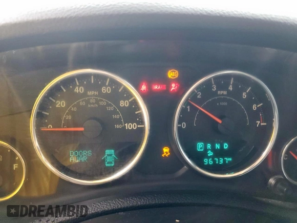 2015 Jeep Wrangler Unlimited Rubicon Hard Rock with VIN 1C4HJWFG1FL710264, listed as a Copart auction lot 54123285 with 96,737 mi miles and Salvage title. Bid and sale history available at DreamBid. Image 9.