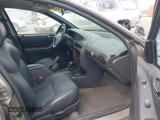1998 Chrysler Cirrus LXi z VIN 1C3EJ56H0WN300229, wystawiony jako IAAI lot #42251263 z przebiegiem 191 491 mil mil oraz . Historia ofert i sprzedaży dostępna na DreamBid. Obrazek 5.