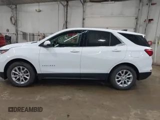 2018 Chevrolet Equinox LT z VIN 3GNAXSEVXJS587177, wystawiony jako IAAI lot #42322966 z przebiegiem 73 893 mil mil oraz . Historia ofert i sprzedaży dostępna na DreamBid. Obrazek 14.