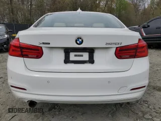 2017 BMW 3 Series 320i xDrive with VIN WBA8E5G5XHNU22436, listed as a Copart auction lot 52702805 with 74,008 mi miles and Salvage title. Bid and sale history available at DreamBid. Image 6.