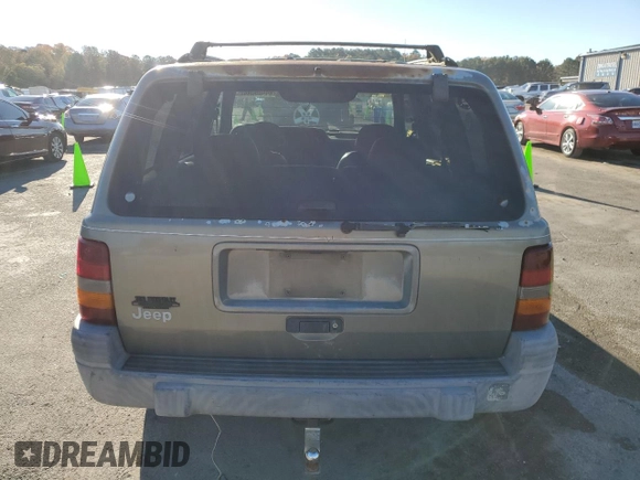 1997 Jeep Grand Cherokee TSi with VIN 1J4FX58S4VC516340, listed as a Copart auction lot 84409044 with 256,300 mi miles and Clean Title. Bid and sale history available at carsss.com. Image 6.