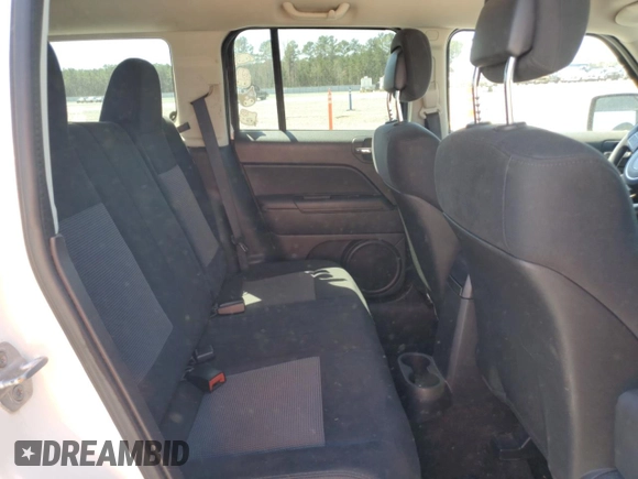 2013 Jeep Patriot Sport z VIN 1C4NJPBB7DD250683, wystawiony jako Copart lot #50520995 z przebiegiem 136 306 mil mil oraz Szkoda całkowita • Salvage title. Historia ofert i sprzedaży dostępna na DreamBid. Obrazek 11.