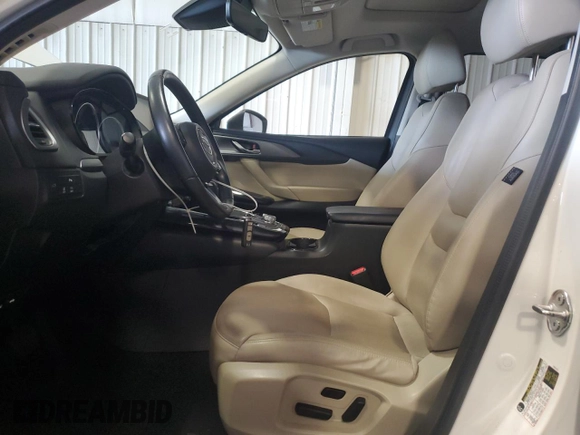 2019 Mazda CX-9 Touring with VIN JM3TCBCY3K0317900, listed as a Copart auction lot 64180945 with 63,721 mi miles and Salvage title. Bid and sale history available at DreamBid. Image 7.