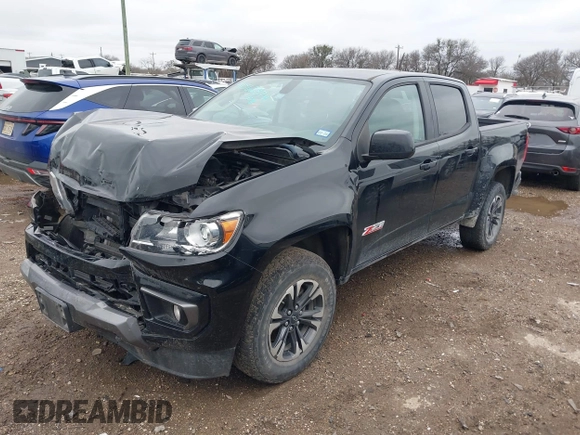 2021 Chevrolet Colorado 2WD Z71 with VIN 1GCGSDEN3M1108777, listed as a IAAI auction lot 41562874 with 77,607 mi miles and . Bid and sale history available at DreamBid. Image 2.