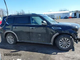 2017 Nissan Armada SV z VIN JN8AY2NC2H9504072, wystawiony jako IAAI lot #41660343 z przebiegiem 106 316 mil mil oraz . Historia ofert i sprzedaży dostępna na DreamBid. Obrazek 13.