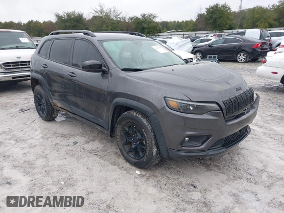 2022 Jeep Cherokee X with VIN 1C4PJMCX0ND538919, listed as a IAAI auction lot 41321416 with 65,577 mi miles. Bid and sale history available at carsss.com. Image 1.
