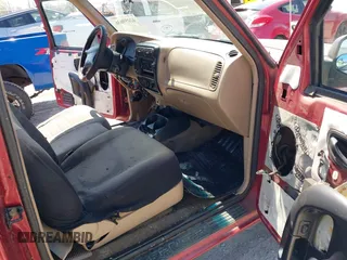 1997 Ford Ranger XLT with VIN 1FTCR14X9VPA31147, listed as a IAAI auction lot 42059636 with 211,883 mi miles. Bid and sale history available at carsss.com. Image 5.