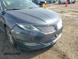 2013 Lincoln MKZ z VIN 3LN6L2G99DR803487, wystawiony jako Copart lot #58232125 z przebiegiem 123 005 mil mil oraz Szkoda całkowita • Salvage title. Historia ofert i sprzedaży dostępna na DreamBid. Obrazek 13.