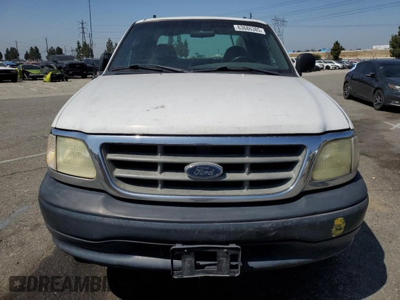 2003 Ford F-150 XL with VIN 1FTRX17W53NA54971, listed as a Copart auction lot 63686385 with 133,800 mi miles and Salvage title. Bid and sale history available at DreamBid. Image 5.