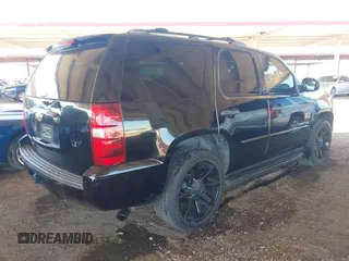 2007 Chevrolet Tahoe LS with VIN 1GNFC13C07J400472, listed as a IAAI auction lot 42209311 with 212,924 mi miles and . Bid and sale history available at DreamBid. Image 4.