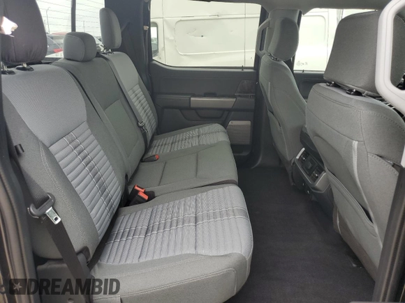 2023 Ford F-150 XL with VIN 1FTFW1E84PKE35275, listed as a Copart auction lot 61867535 with 22,142 mi miles and Salvage title. Bid and sale history available at DreamBid. Image 10.
