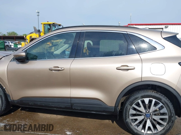 2020 Ford Escape Titanium z VIN 1FMCU9J92LUB48243, wystawiony jako IAAI lot #42143038 z przebiegiem 63 172 mil mil oraz . Historia ofert i sprzedaży dostępna na DreamBid. Obrazek 15.