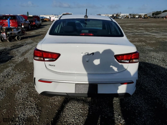 2022 Kia Rio S with VIN 3KPA24AD8NE501028, listed as a Copart auction lot 49511775 with 26,833 mi miles and Salvage Title. Bid and sale history available at carsss.com. Image 6.