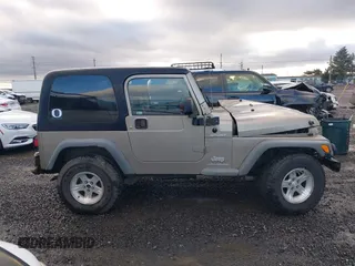 2004 Jeep Wrangler Sport with VIN 1J4FA49S94P711531, listed as a IAAI auction lot 41306863 with 143,720 mi miles and . Bid and sale history available at DreamBid. Image 14.