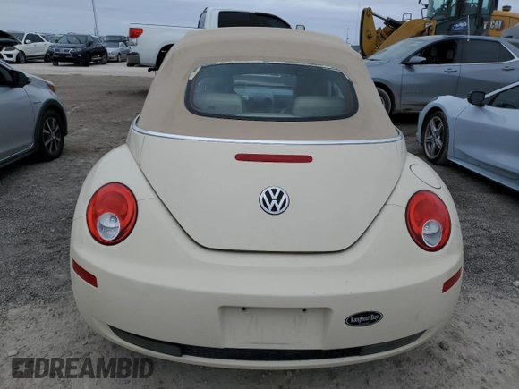 2006 Volkswagen Beetle z VIN 3VWPF31Y06M309862, wystawiony jako Copart lot #76907554 z przebiegiem Nie podano mil oraz Szkoda całkowita • Salvage title. Historia ofert i sprzedaży dostępna na DreamBid. Obrazek 6.