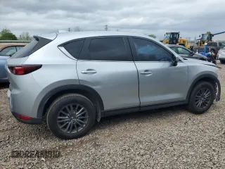 2020 Mazda CX-5 Touring z VIN JM3KFBCM2L0750223, wystawiony jako Copart lot #56300415 z przebiegiem 87 392 mil mil oraz Szkoda całkowita • Salvage title. Historia ofert i sprzedaży dostępna na DreamBid. Obrazek 3.