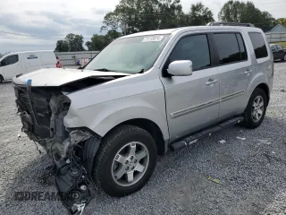 2010 Honda Pilot Touring with VIN 5FNYF3H82AB011212, listed as a Copart auction lot 71115874 with 248,495 mi miles and Salvage Title. Bid and sale history available at carsss.com. Image 1.