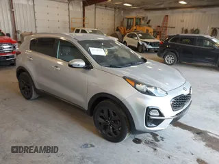 2020 Kia Sportage S with VIN KNDP6CAC3L7813464, listed as a IAAI auction lot 42128252 with 76,271 mi miles. Bid and sale history available at carsss.com. Image 1.