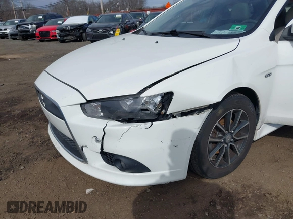 2015 Mitsubishi Lancer SE with VIN JA32V2FW9FU025402, listed as a IAAI auction lot 41646407 with 67,201 mi miles. Bid and sale history available at carsss.com. Image 6.