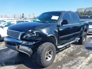 2003 Ford F-150 XLT with VIN 1FTRW07L33KA64046, listed as a IAAI auction lot 41754147 with Not Provided miles. Bid and sale history available at carsss.com. Image 2.