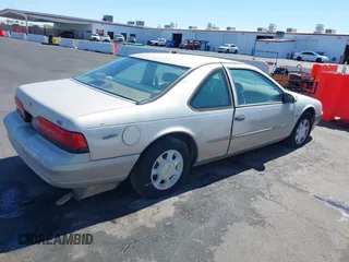 1995 Ford Thunderbird LX with VIN 1FALP62W4SH127020, listed as a IAAI auction lot 41823705 with 199,600 mi miles and . Bid and sale history available at DreamBid. Image 4.
