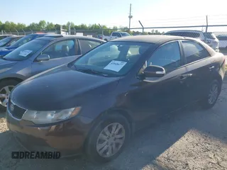 2010 Kia Forte EX with VIN KNAFU4A26A5306448, listed as a IAAI auction lot 42048677 with 172,095 mi miles. Bid and sale history available at carsss.com. Image 15.
