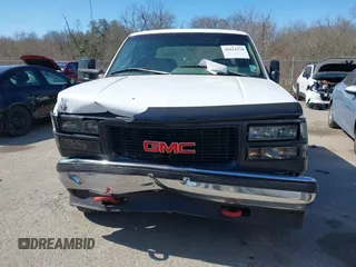 1996 GMC Sierra 1500 with VIN 1GTGC33R4TF018147, listed as a IAAI auction lot 41612770 with 106,443 mi miles and . Bid and sale history available at DreamBid. Image 12.