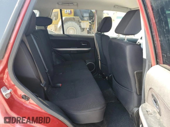 2012 Suzuki Grand Vitara Premium z VIN JS3TD0D60C4100503, wystawiony jako Copart lot #59050575 z przebiegiem 158 052 mil mil oraz Tytuł czysty. Historia ofert i sprzedaży dostępna na DreamBid. Obrazek 11.