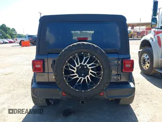 2018 Jeep Wrangler Unlimited Sport S с VIN 1C4HJXDN6JW277829, выставлен на аукционе IAAI как лот 42607187 с пробегом 107 461 миль миль и . История ставок и продаж доступна на DreamBid. Изображение 16.
