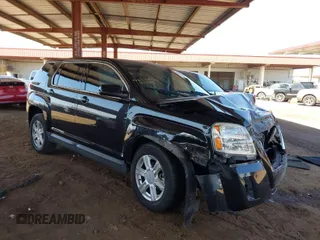 2014 GMC Terrain SLE with VIN 2GKALMEKXE6322399, listed as a IAAI auction lot 41975078 with 142,002 mi miles. Bid and sale history available at carsss.com. Image 1.