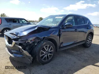 2017 Mazda CX-5 Grand Touring with VIN JM3KFBDL1H0207491, listed as a Copart auction lot 51382575 with 76,113 mi miles and Salvage Title. Bid and sale history available at carsss.com. Image 1.