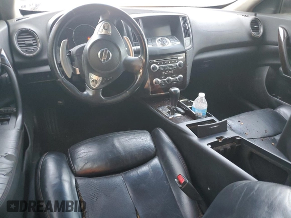 2010 Nissan Maxima SV with VIN 1N4AA5AP9AC804281, listed as a Copart auction lot 56912815 with 257,381 mi miles and Salvage title. Bid and sale history available at DreamBid. Image 8.