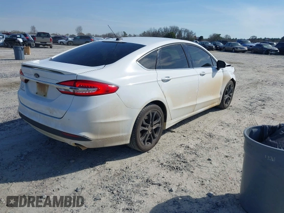 2018 Ford Fusion S with VIN 3FA6P0G7XJR216535, listed as a IAAI auction lot 41640799 with 183,932 mi miles. Bid and sale history available at carsss.com. Image 4.