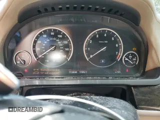 2013 BMW 7 Series 750Li xDrive with VIN WBAYF8C57DD140694, listed as a Copart auction lot 56983435 with 113,444 mi miles and Salvage title. Bid and sale history available at DreamBid. Image 9.