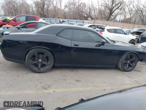 2015 Dodge Challenger R/T with VIN 2C3CDZATXFH712765, listed as a IAAI auction lot 41817210 with 99,535 mi miles and . Bid and sale history available at DreamBid. Image 14.