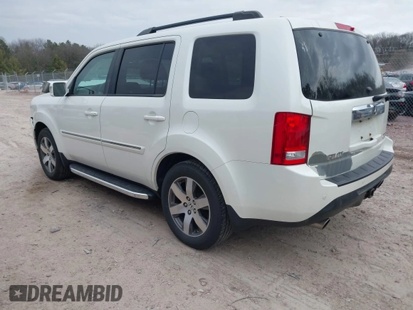 2014 Honda Pilot Touring with VIN 5FNYF4H91EB041614, listed as a IAAI auction lot 42050405 with 158,236 mi miles and . Bid and sale history available at DreamBid. Image 3.