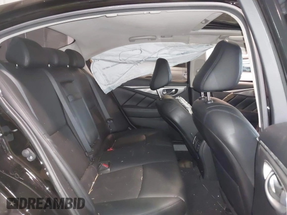 2015 Infiniti Q50 z VIN JN1BV7AP0FM343815, wystawiony jako IAAI lot #41750679 z przebiegiem 88 552 mil mil oraz . Historia ofert i sprzedaży dostępna na DreamBid. Obrazek 8.